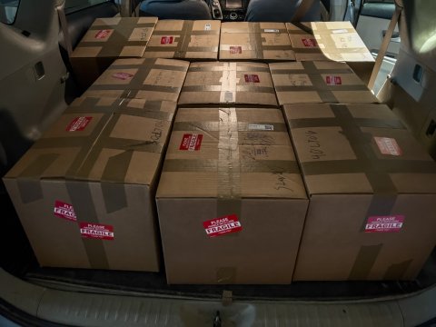 A Prius filled with boxes of tape and hard drves